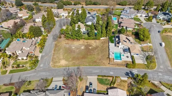 an aerial view of residential house with outdoor space