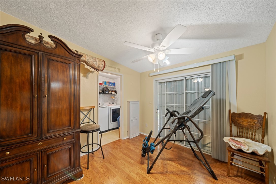919 Manatee Road Naples, FL 34114 - Photo 15 of 32 a view of a room with gym equipment