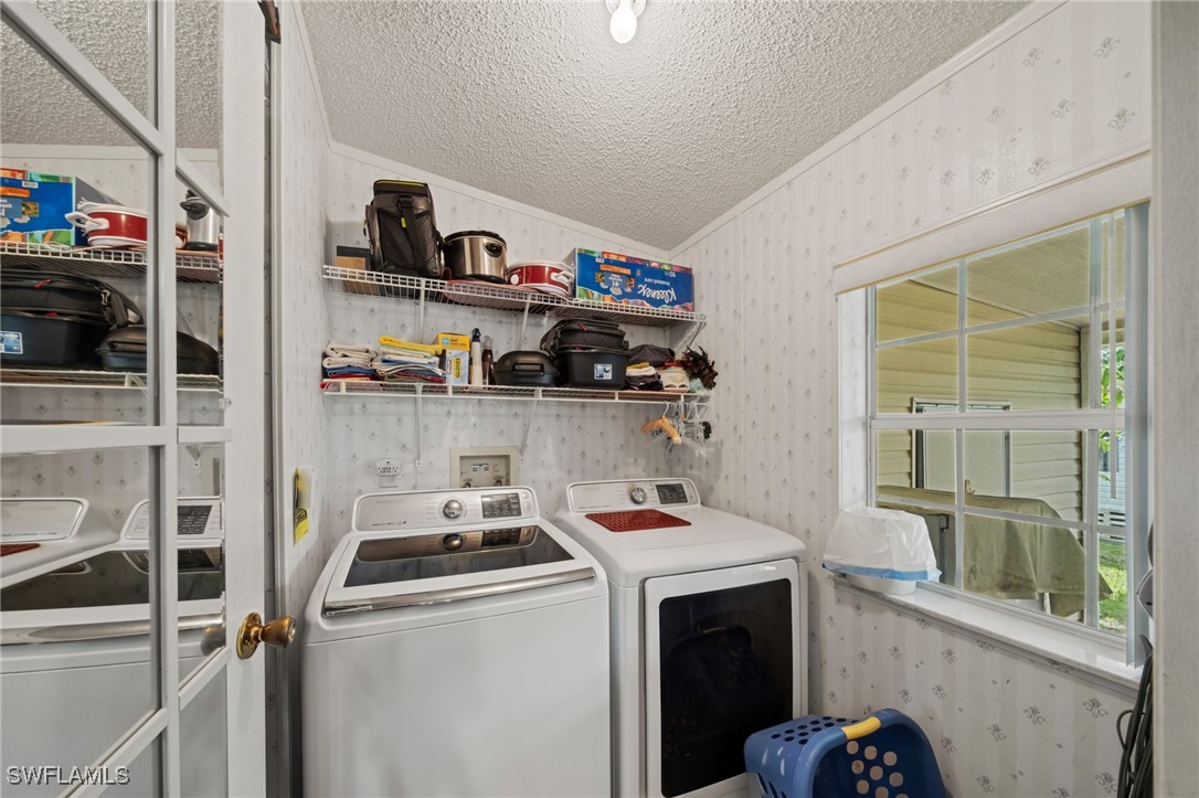 919 Manatee Road Naples, FL 34114 - Photo 23 of 32 a room with storage and utility