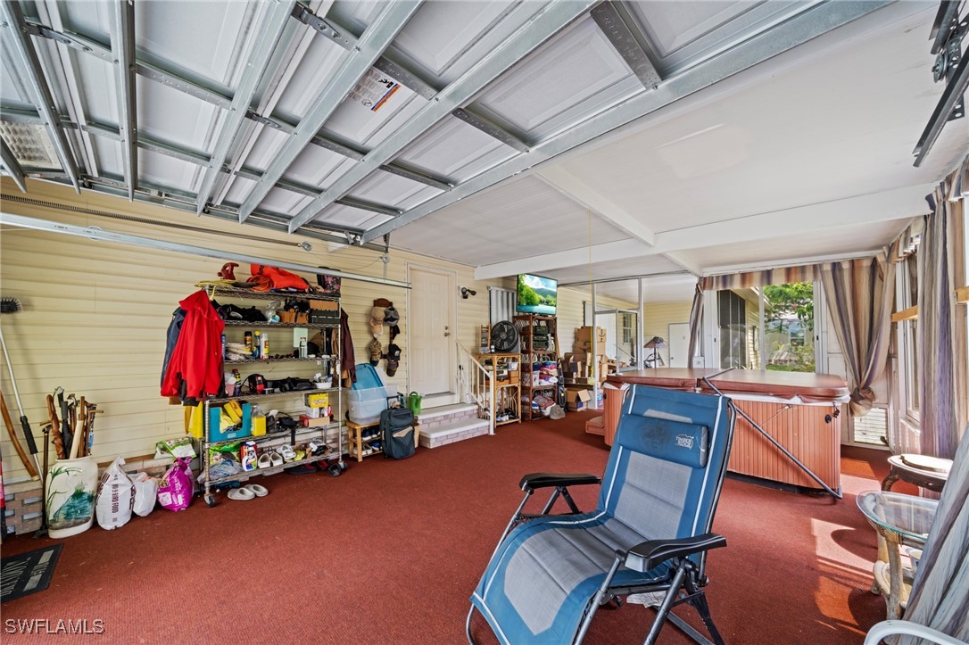 919 Manatee Road Naples, FL 34114 - Photo 25 of 32 a view of a room with gym equipment
