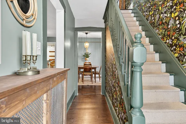 a bathroom with a mirror and a sink
