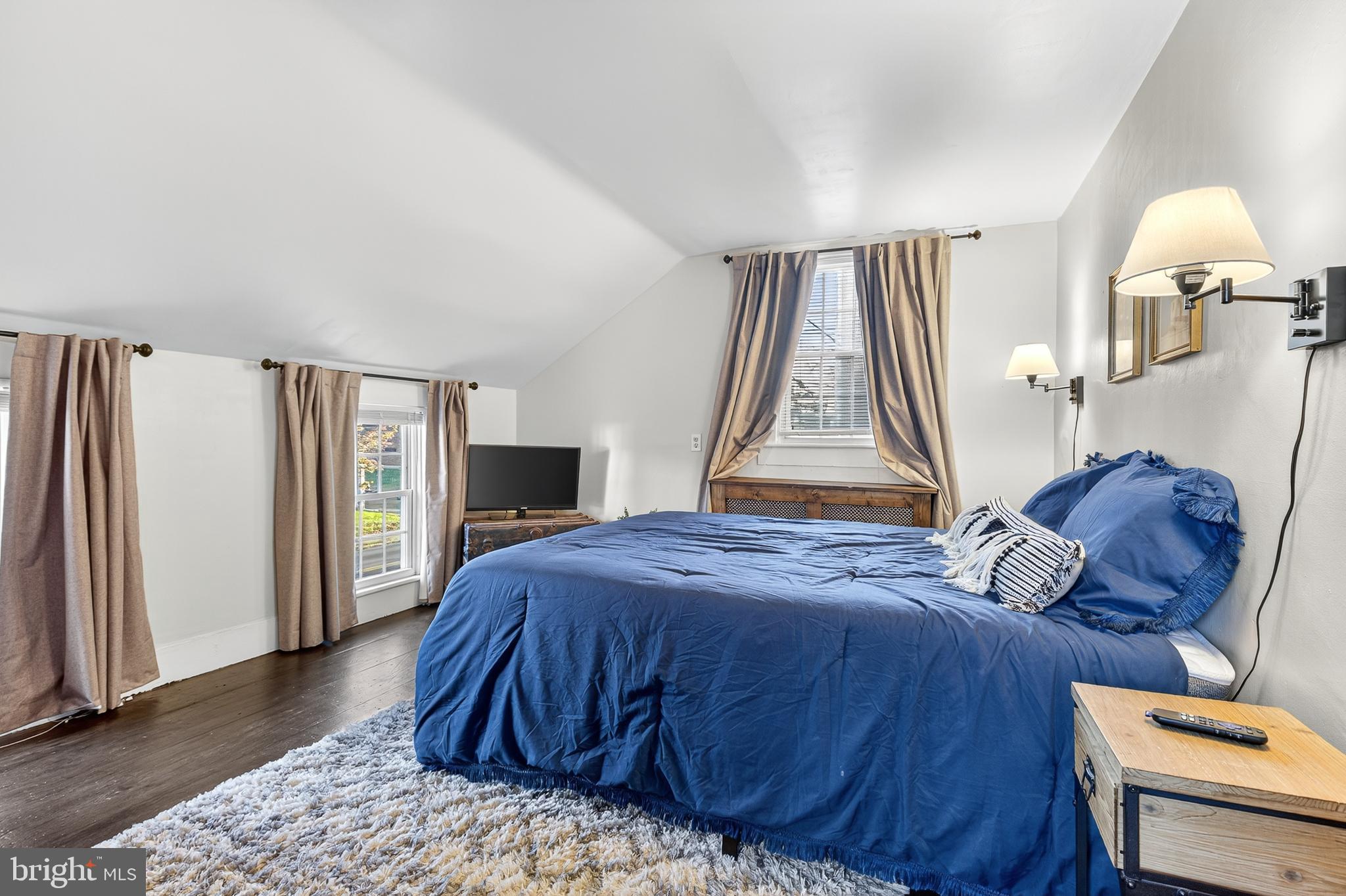 130 East High Street Manheim, PA 17545 - Photo 18 of 34 a bedroom with a bed and a window