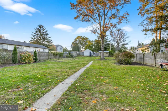 a view of a backyard with a garden