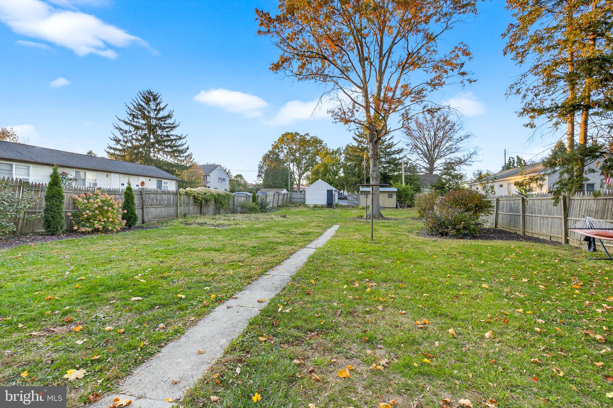 130 East High Street Manheim, PA 17545 - Photo 2 of 34 a view of a backyard with a garden