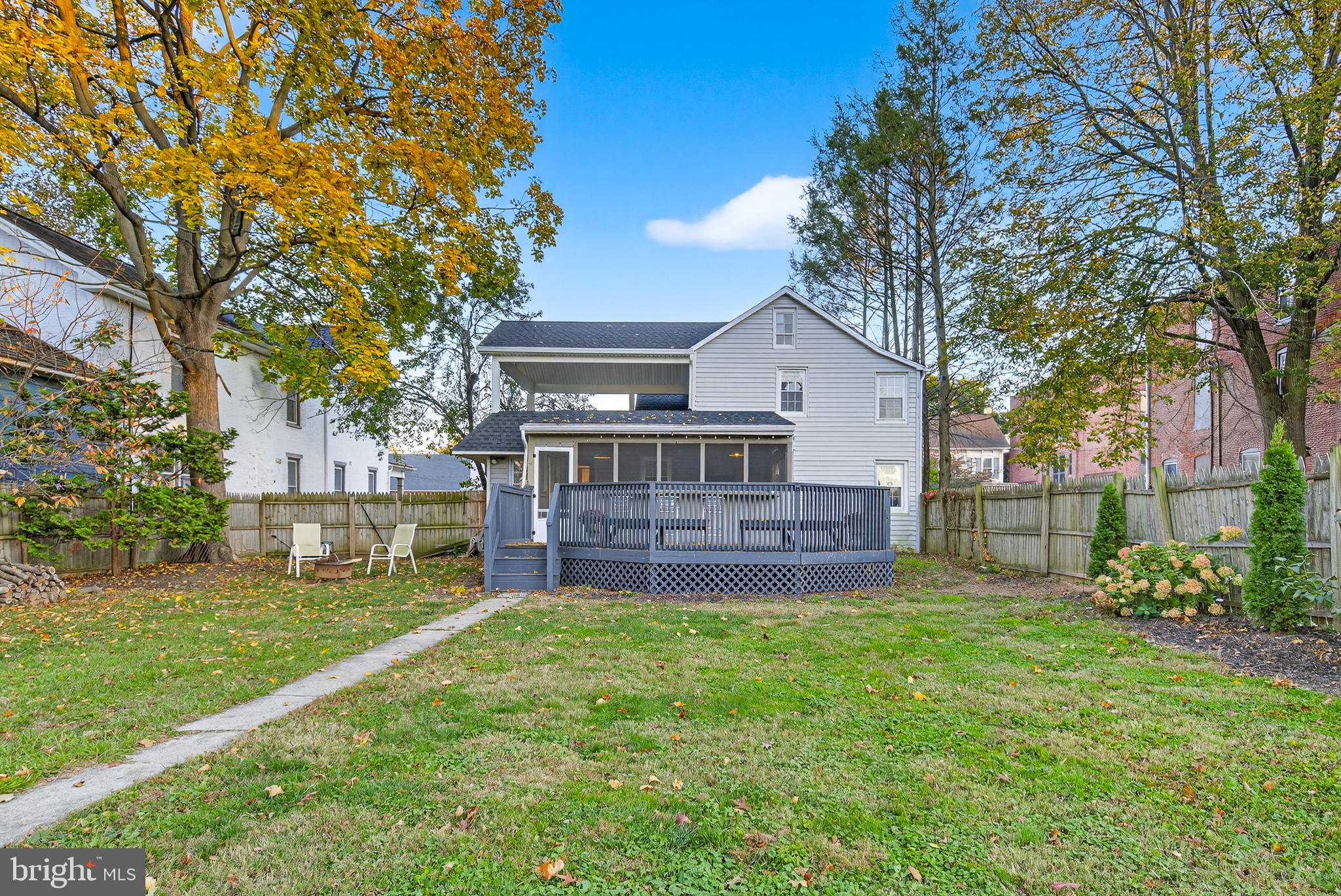 130 East High Street Manheim, PA 17545 - Photo 30 of 34 a view of a house with a big yard and a large tree