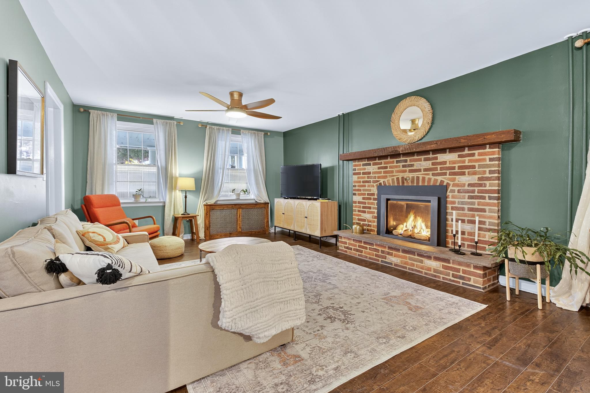 130 East High Street Manheim, PA 17545 - Photo 5 of 34 a living room with furniture and a fireplace