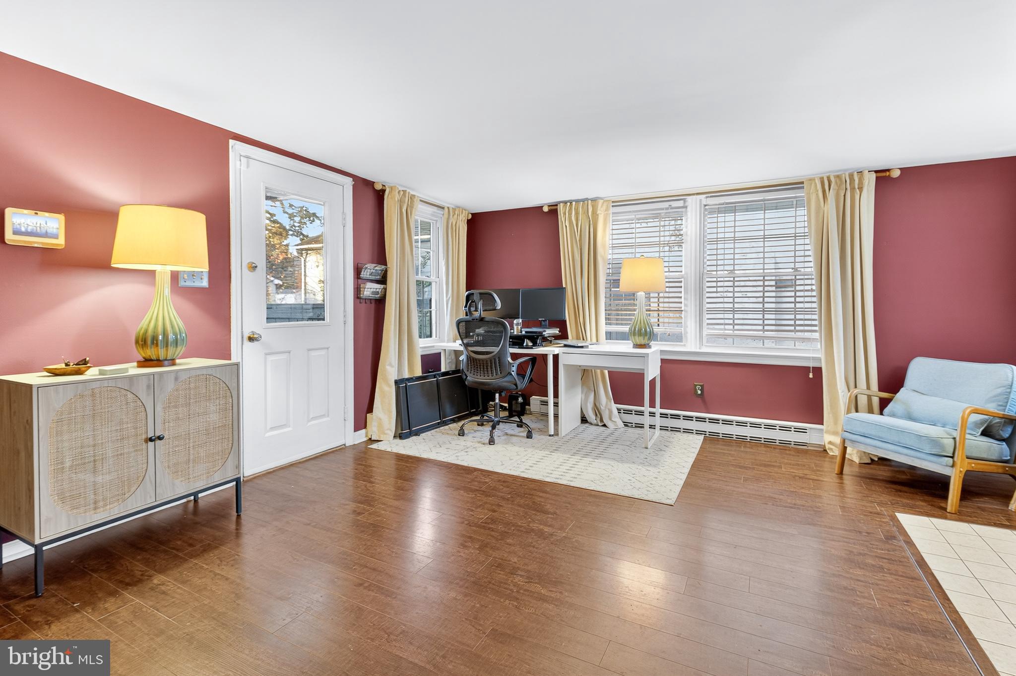 130 East High Street Manheim, PA 17545 - Photo 7 of 34 a living room with furniture and wooden floor