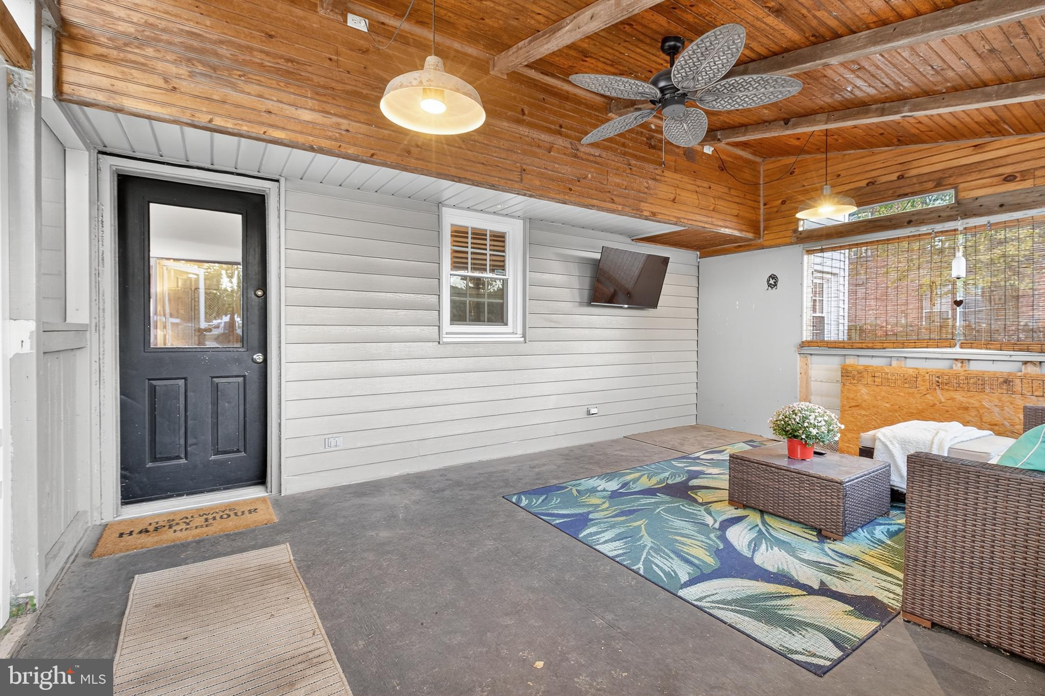 130 East High Street Manheim, PA 17545 - Photo 9 of 34 a outdoor space with patio furniture and potted plants