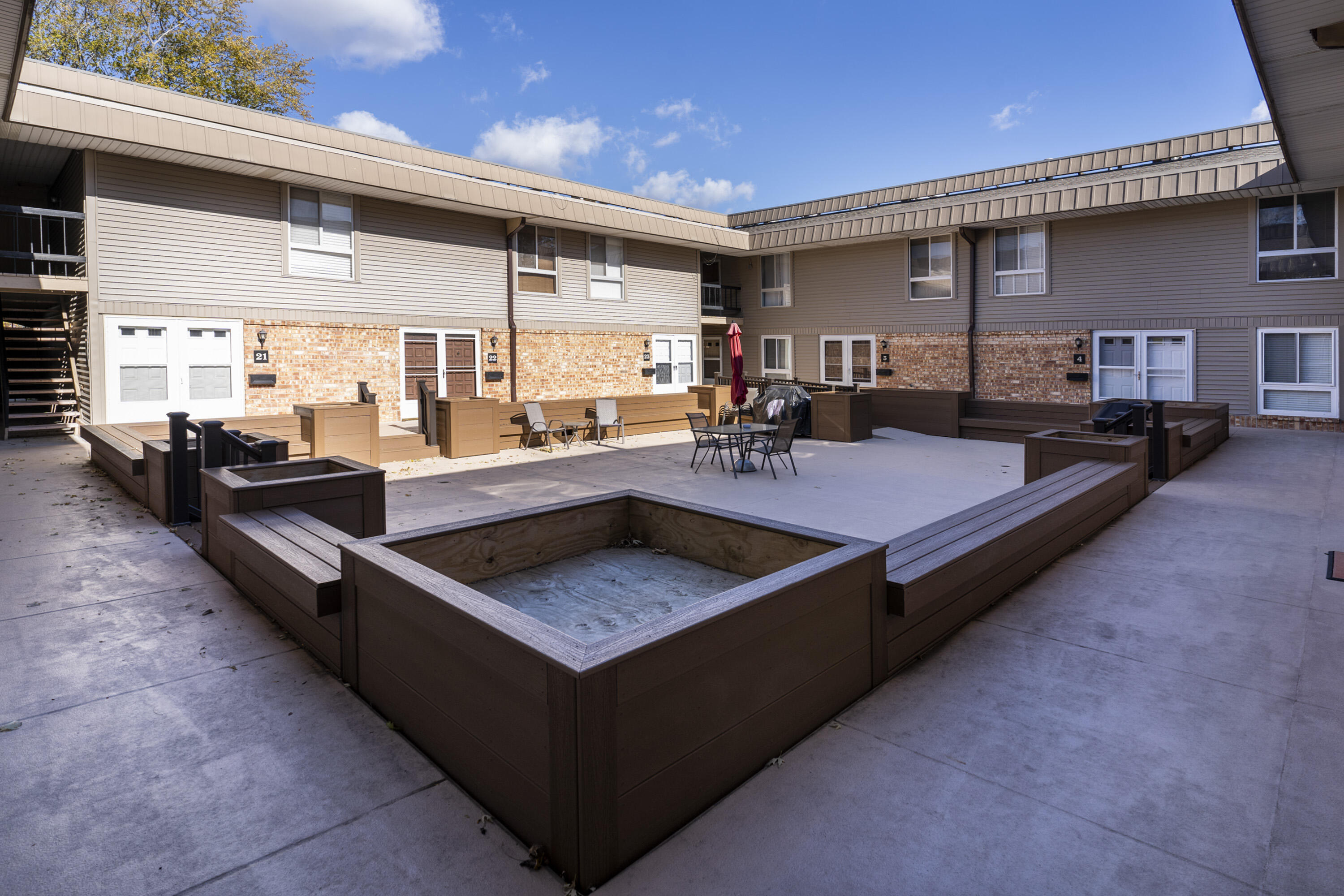 11937 West Appleton Avenue, Unit 14 Milwaukee, WI 53224 - Photo 48 of 64 Building Interior Courtyard