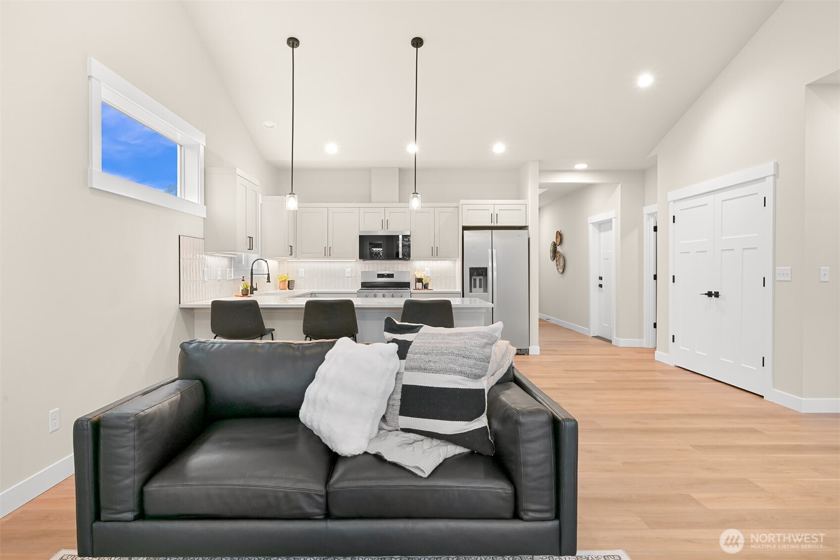 3993 Gentlebrook Lane, Unit 4 Bellingham, WA 98226 - Photo 14 of 27 a living room with furniture and kitchen view
