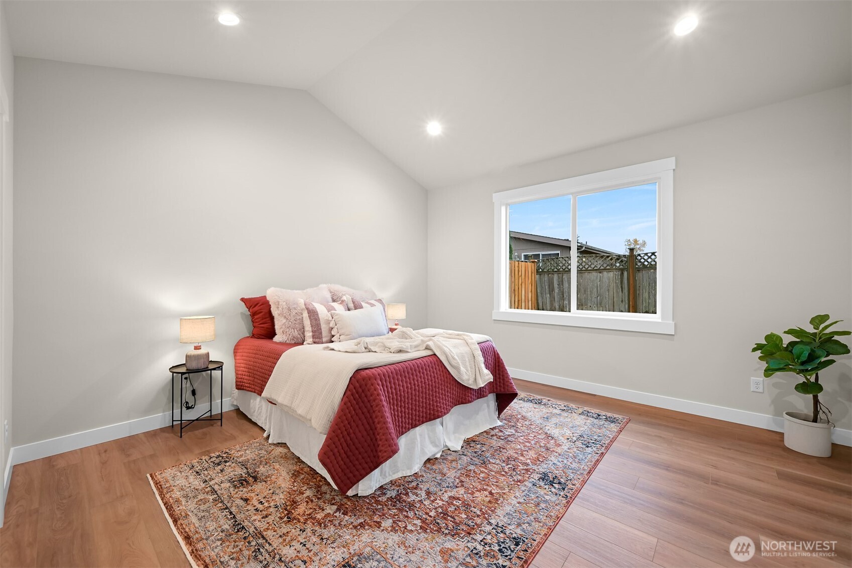 3993 Gentlebrook Lane, Unit 4 Bellingham, WA 98226 - Photo 18 of 27 a bed room with a bed and a window