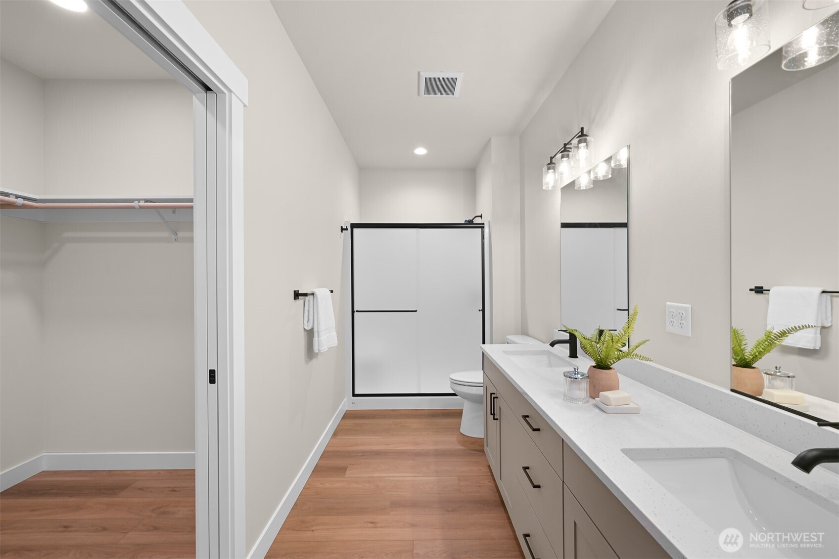 3993 Gentlebrook Lane, Unit 4 Bellingham, WA 98226 - Photo 21 of 27 a spacious bathroom with a double vanity sink and a mirror