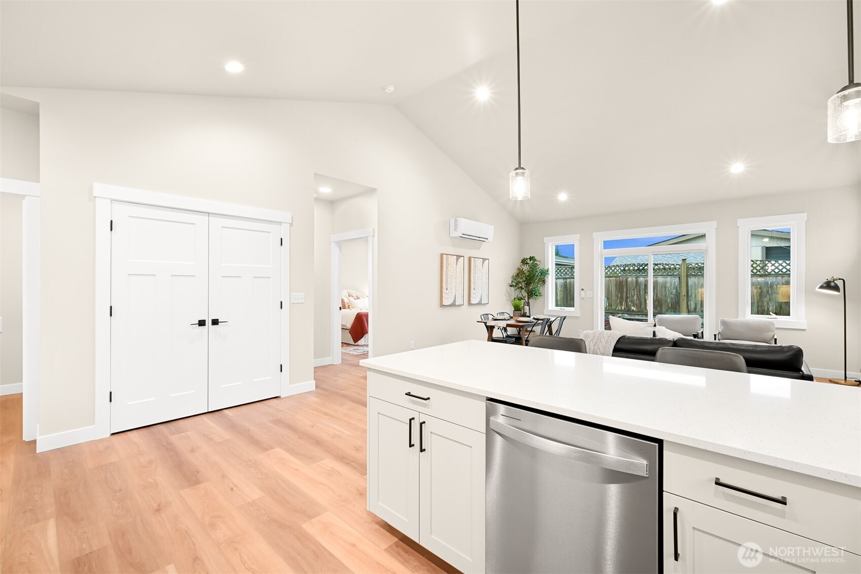 3993 Gentlebrook Lane, Unit 4 Bellingham, WA 98226 - Photo 4 of 27 a kitchen with stainless steel appliances a sink stove and cabinets