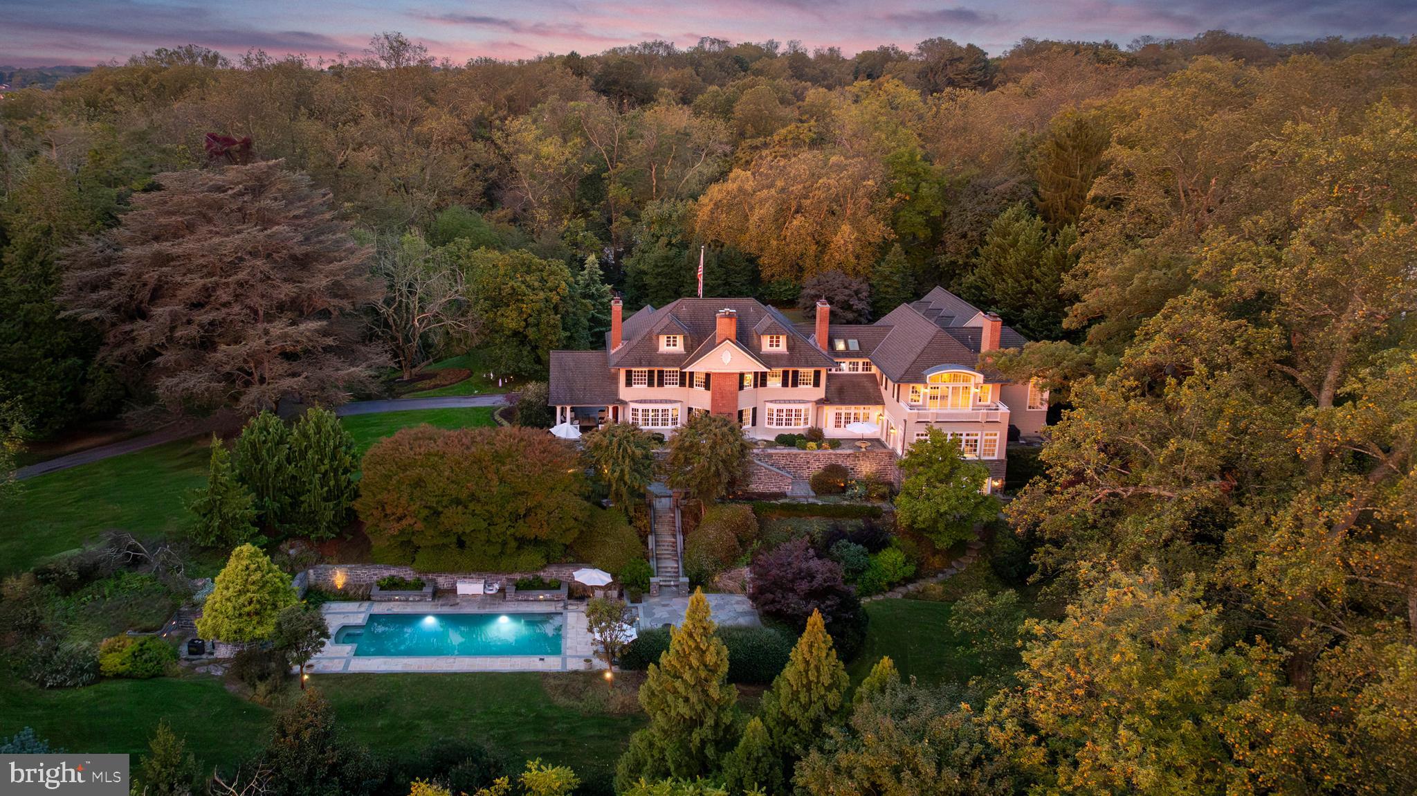 an aerial view of a house with a garden