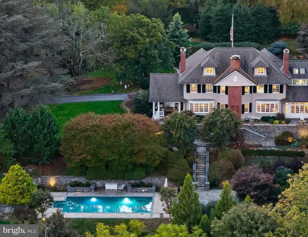 a living room with a couch and a fireplace
