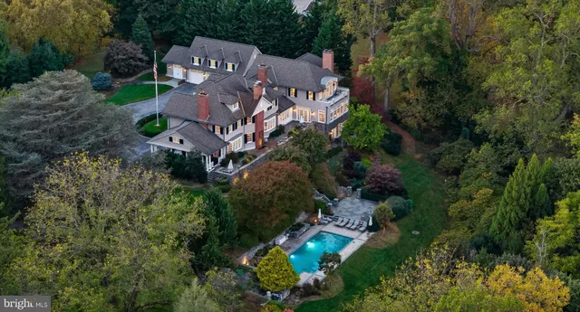 an aerial view of a house with a garden