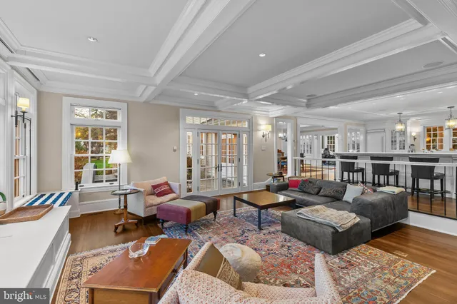 an aerial view of a house with garden space and sitting area