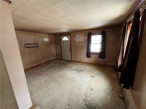 an empty room with windows