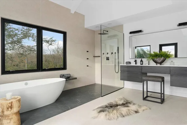 a living room with a couch and a large window