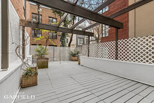 a balcony with wooden floor