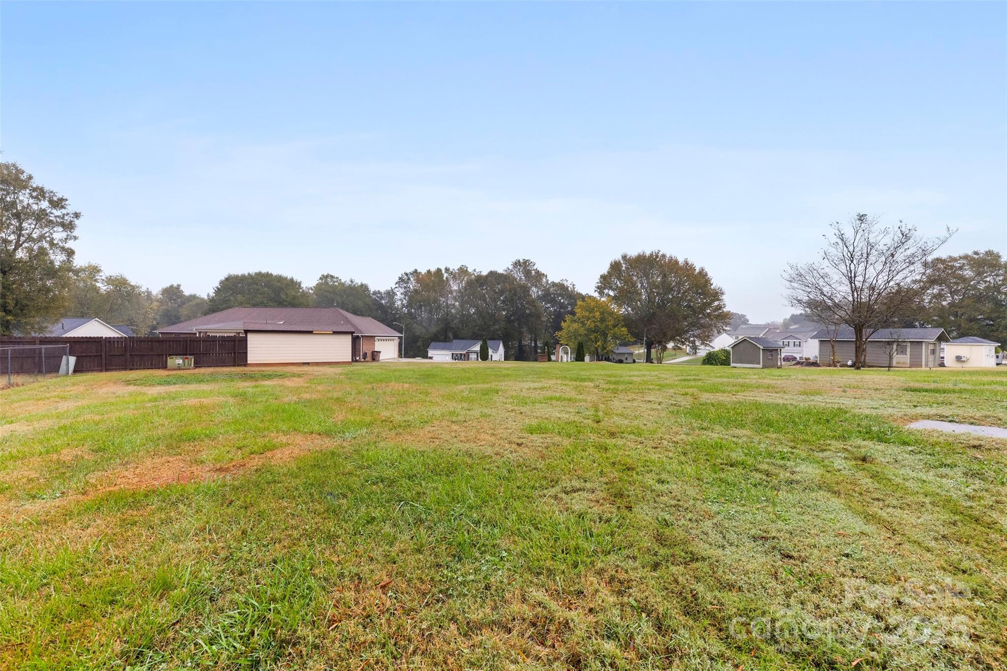 404 James Love School Road Shelby, NC 28152 - Photo 24 of 25 a view of a green field with some trees