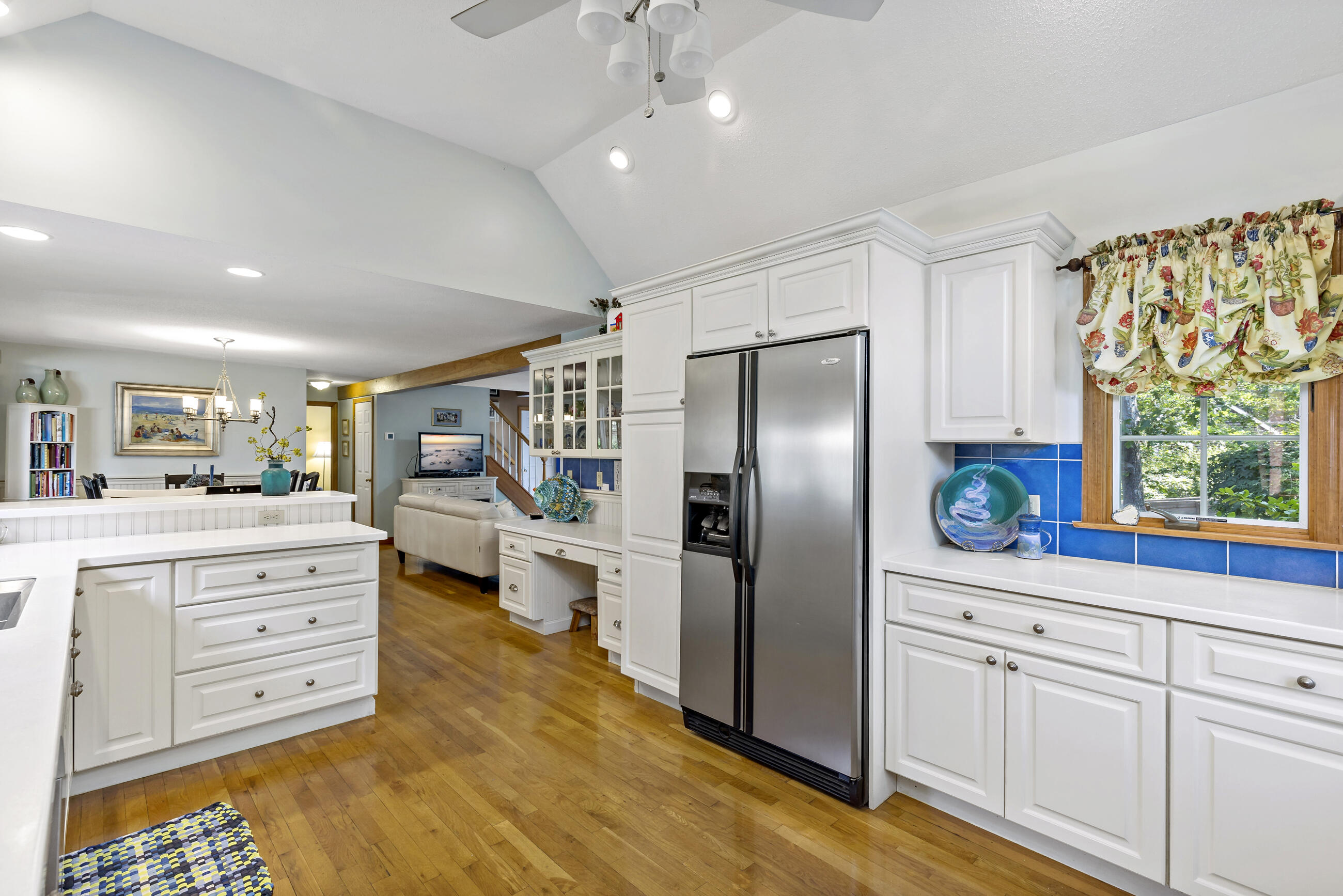 60 Turnip Field Road Eastham, MA 02642 - Photo 13 of 57 a kitchen with stainless steel appliances kitchen island granite countertop a refrigerator and cabinets