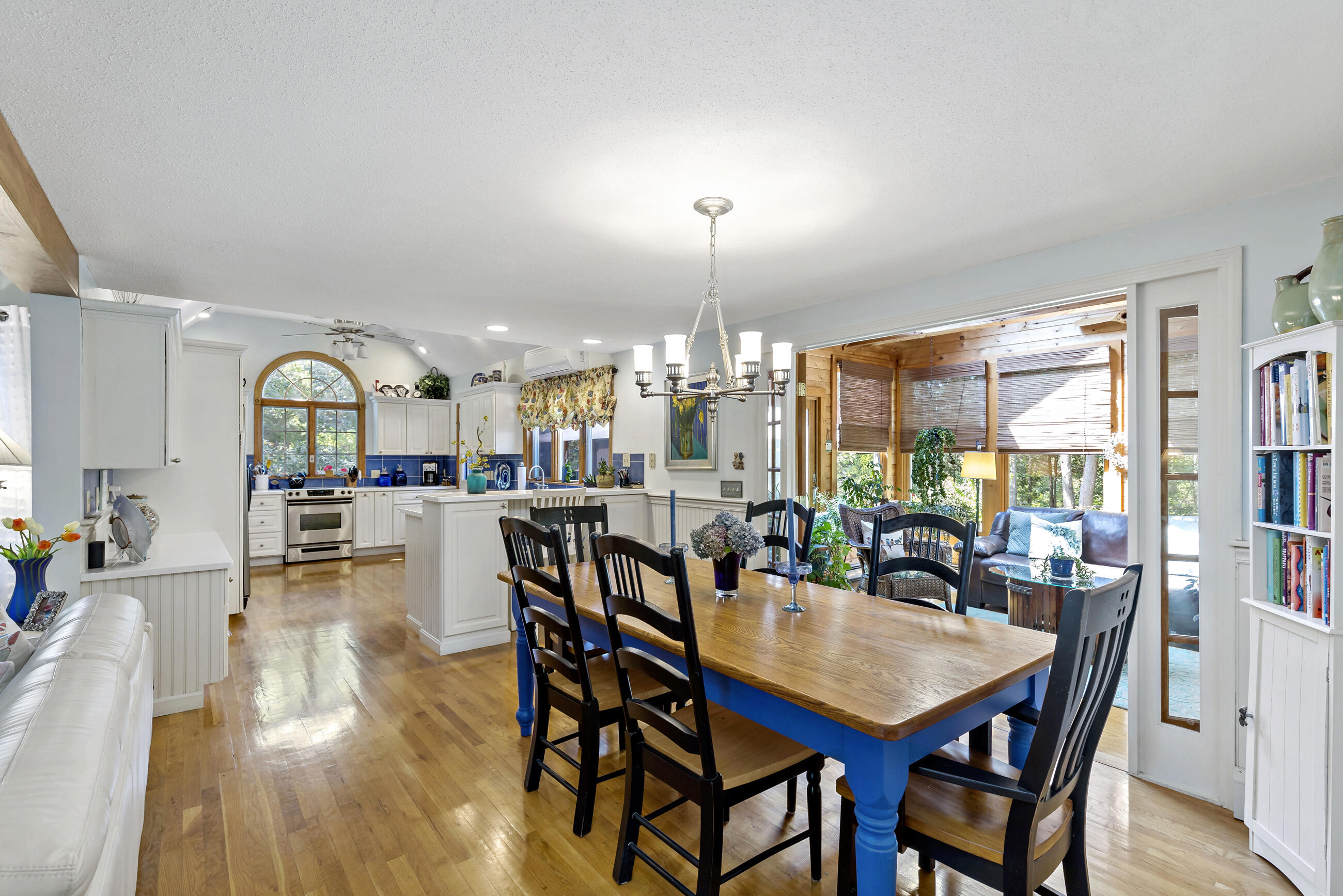 60 Turnip Field Road Eastham, MA 02642 - Photo 18 of 57 a dining room with furniture window and wooden floor