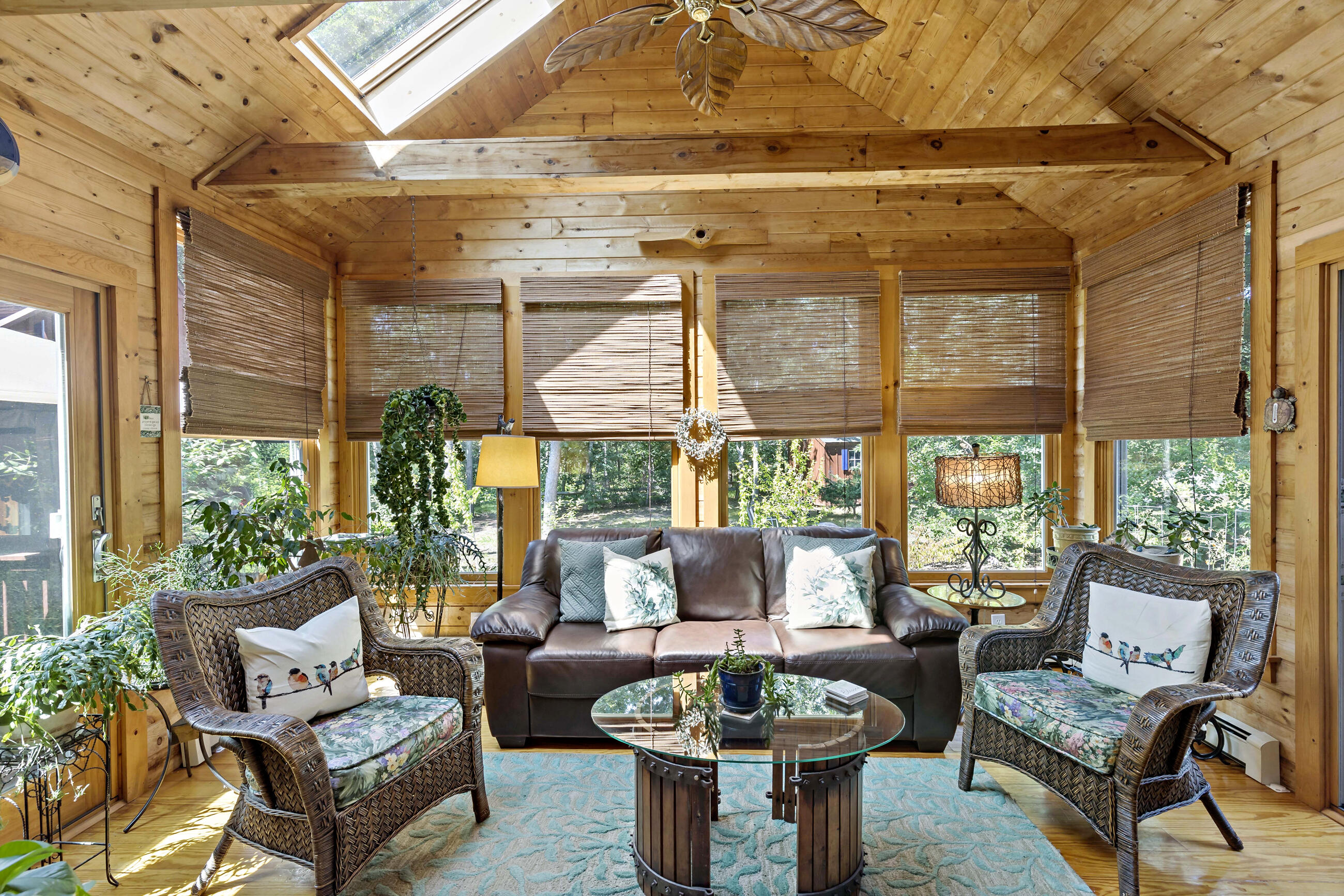 60 Turnip Field Road Eastham, MA 02642 - Photo 19 of 57 a living room with furniture and a potted plant