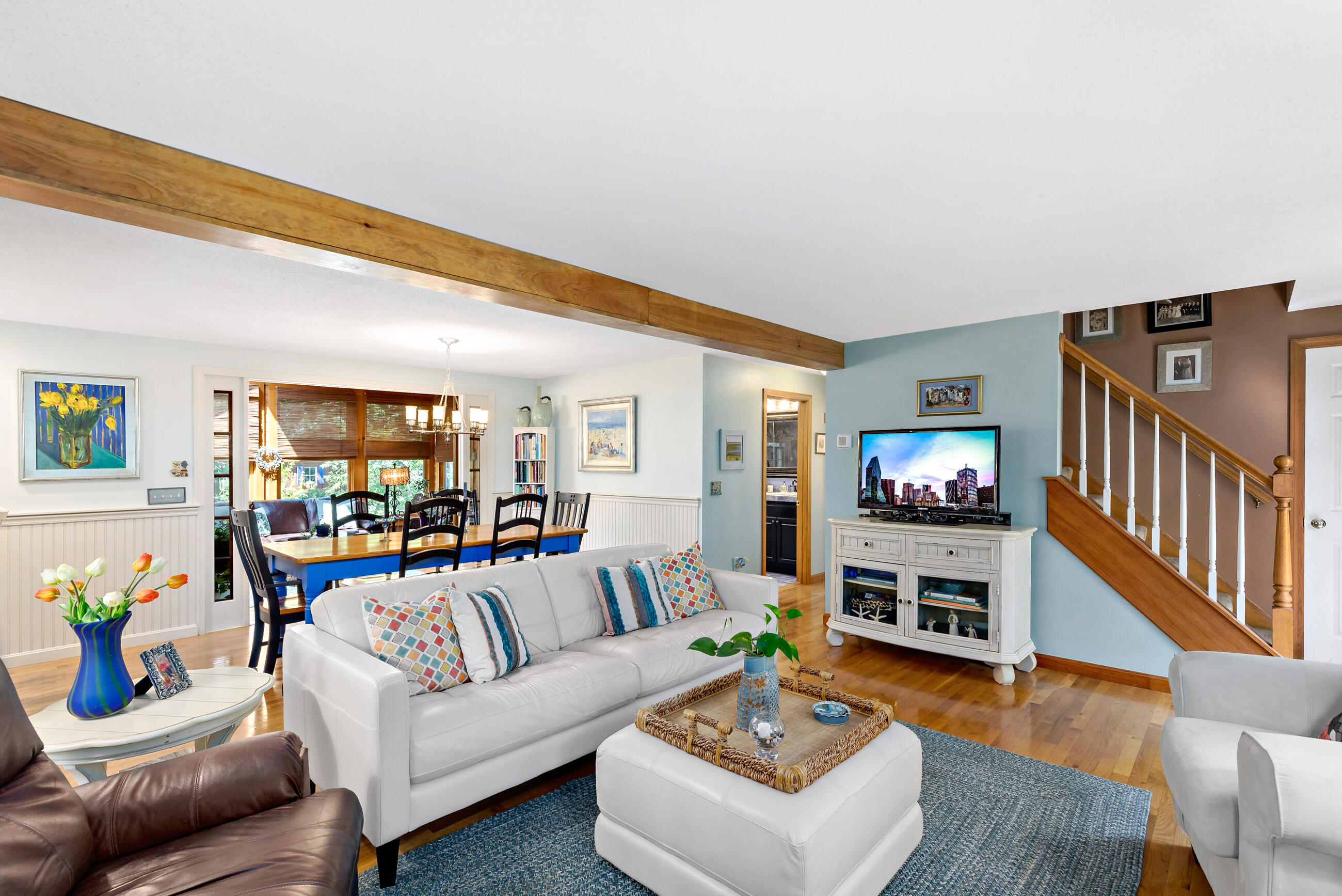 60 Turnip Field Road Eastham, MA 02642 - Photo 24 of 57 a living room with furniture and a flat screen tv