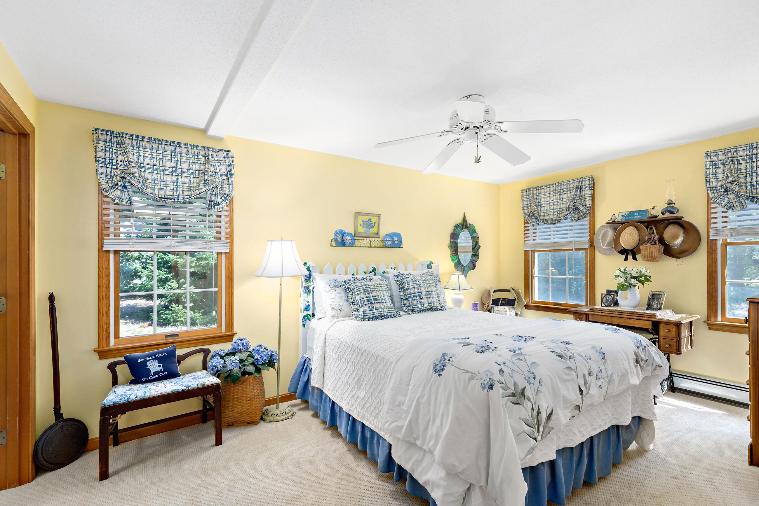 60 Turnip Field Road Eastham, MA 02642 - Photo 26 of 57 a bedroom with a bed and ceiling fan