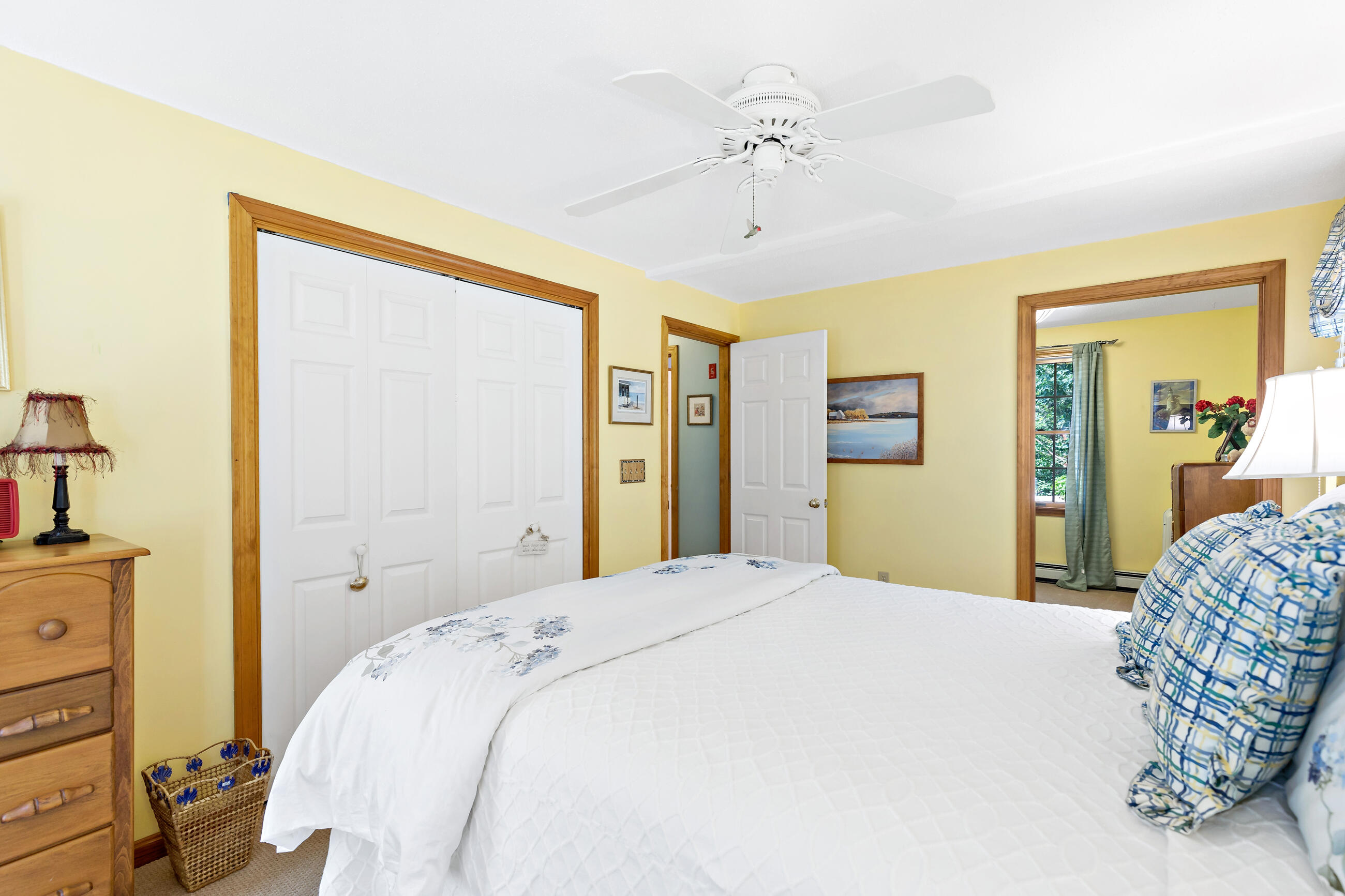 60 Turnip Field Road Eastham, MA 02642 - Photo 27 of 57 a spacious bedroom with a bed and a dresser