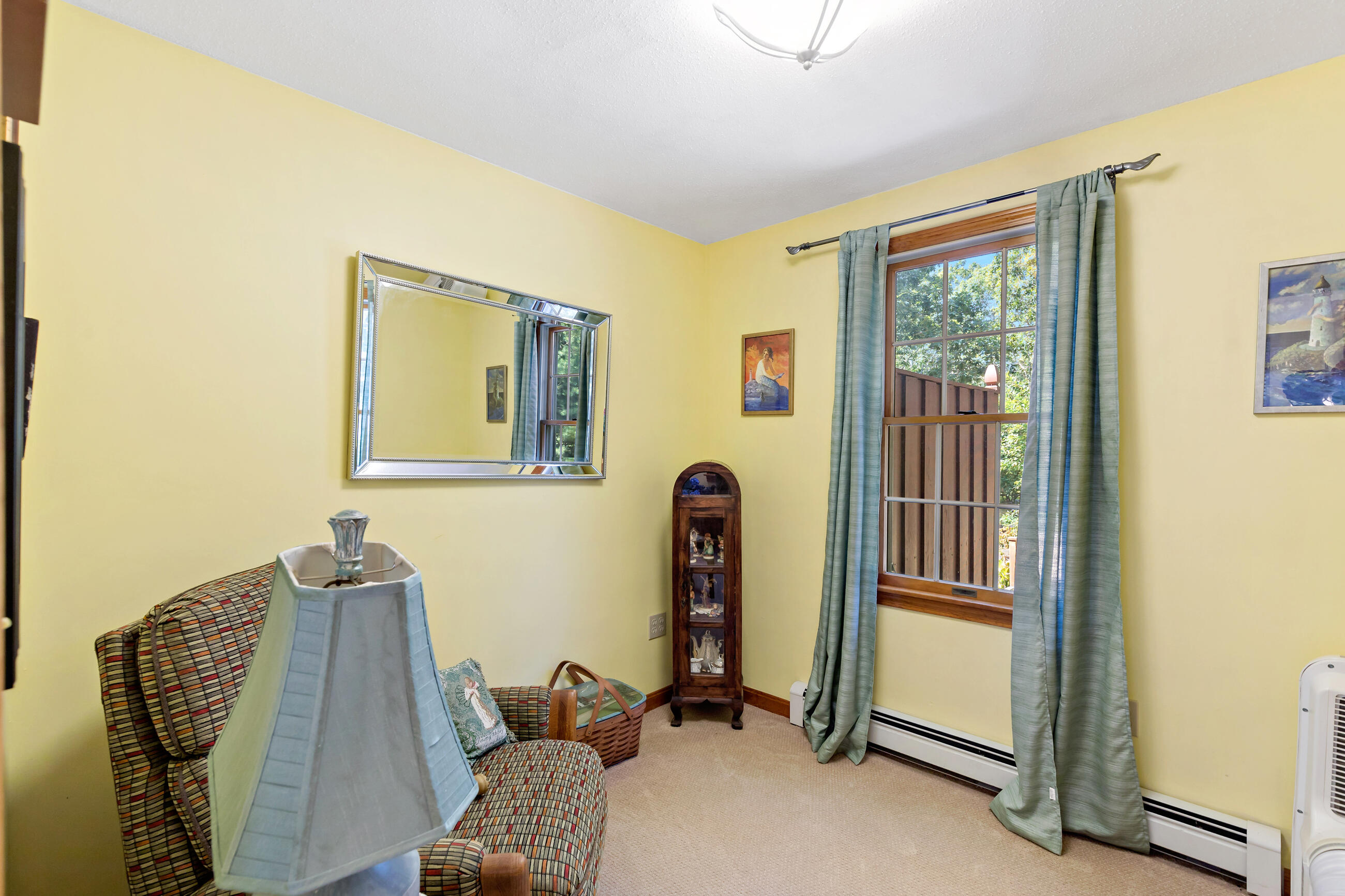 60 Turnip Field Road Eastham, MA 02642 - Photo 29 of 57 a living room with furniture and a window