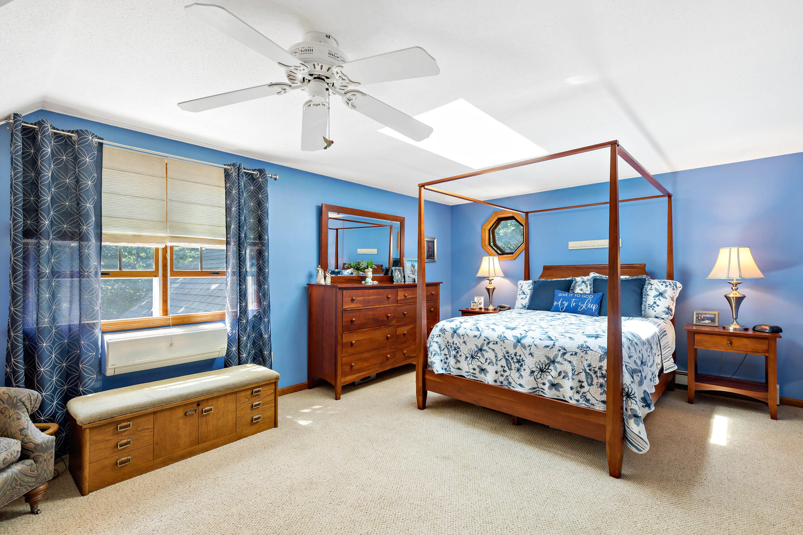 60 Turnip Field Road Eastham, MA 02642 - Photo 32 of 57 a bed room with a bed and a chandelier