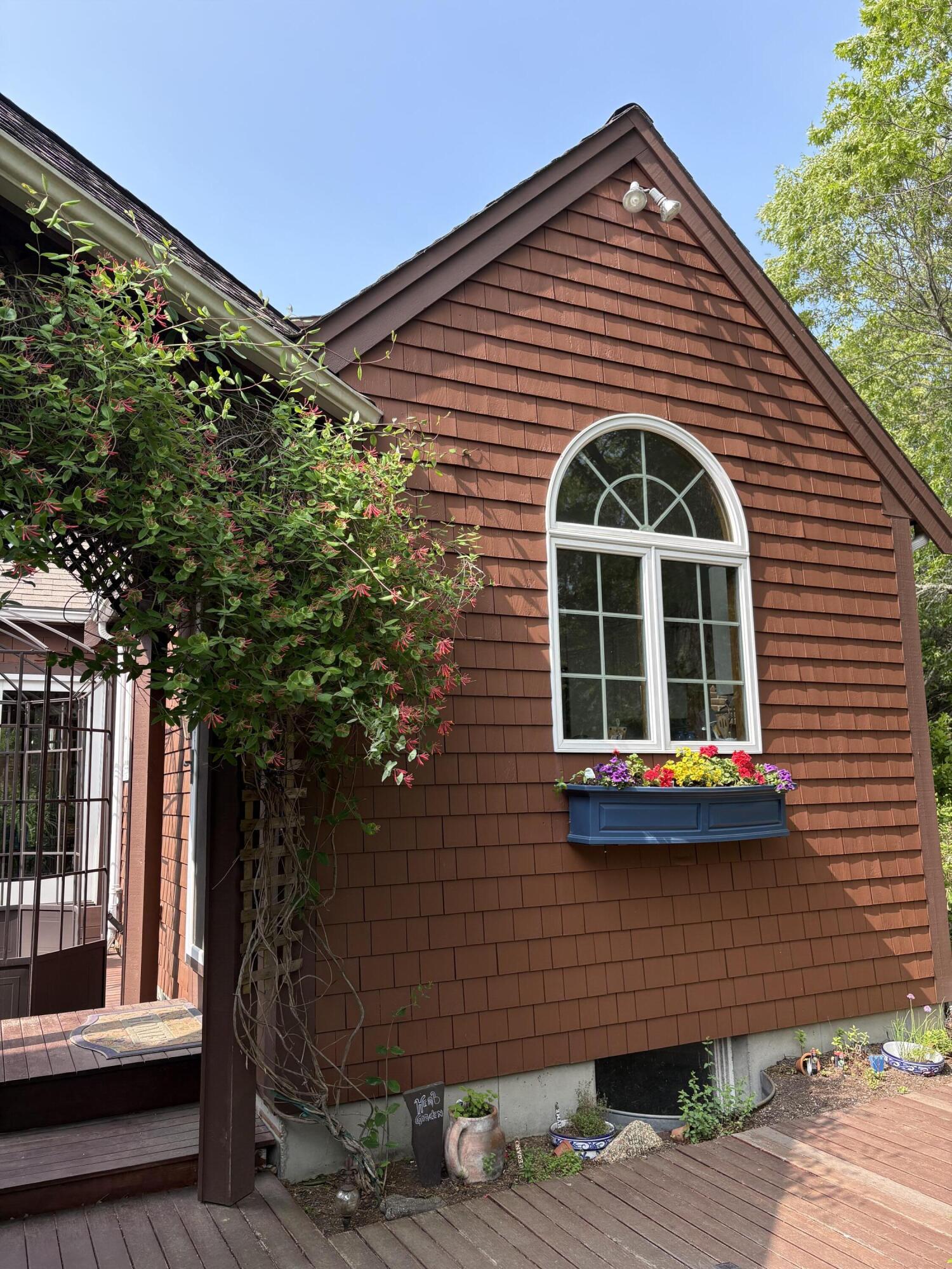60 Turnip Field Road Eastham, MA 02642 - Photo 51 of 57 a front view of a house with a yard