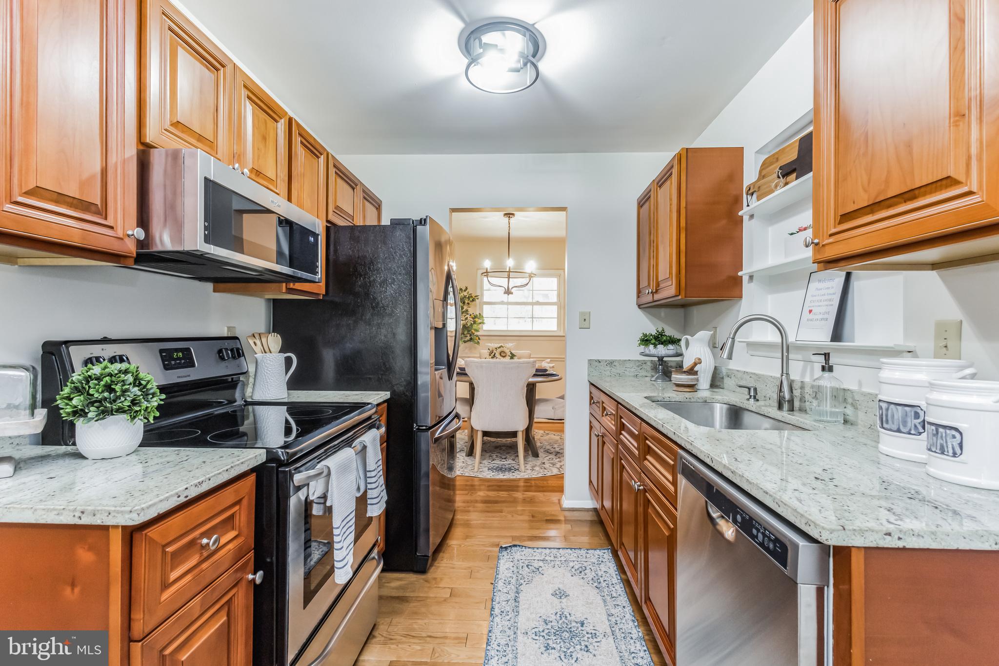 24300 Log House Road Gaithersburg, MD 20882 - Photo 13 of 34 New lighting in the kitchen