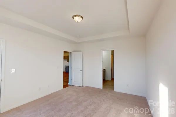 a bathroom with a double vanity sink and mirror