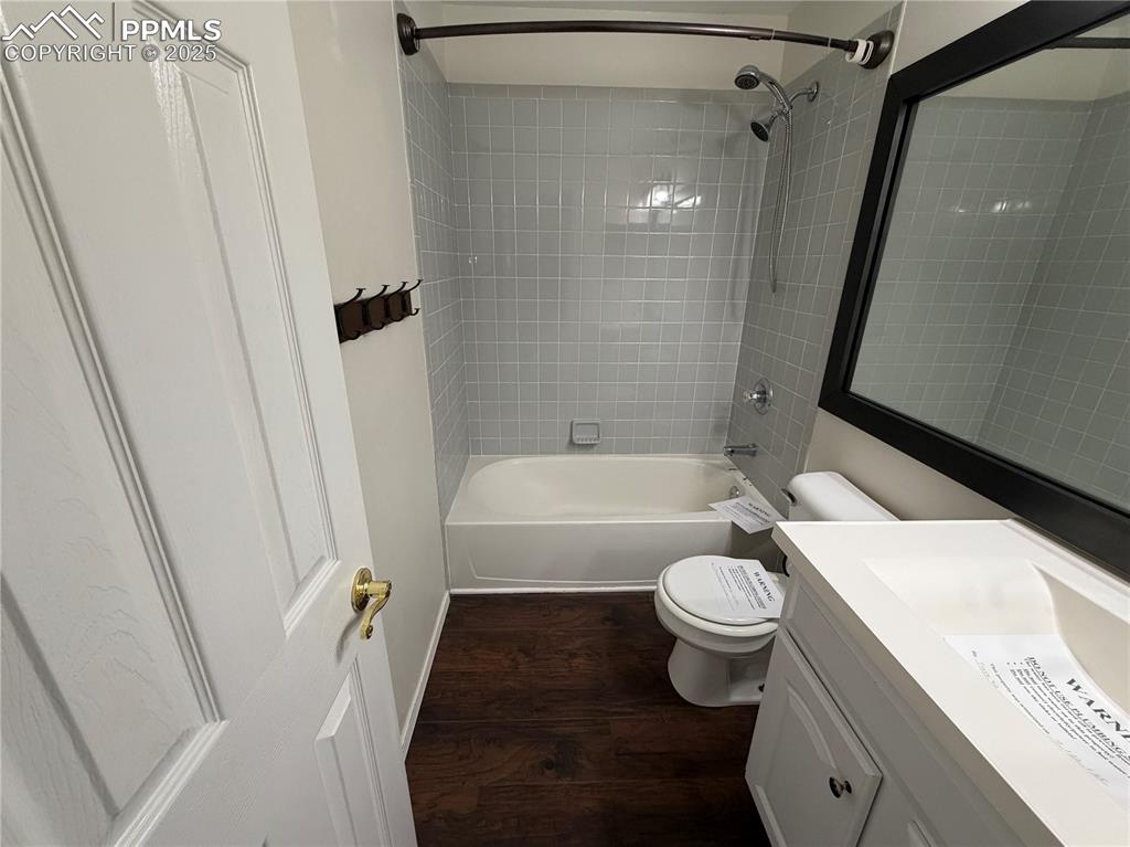 770 Memory Lane Fountain, CO 80817 - Photo 14 of 21 a bathroom with a sink a toilet a mirror and shower