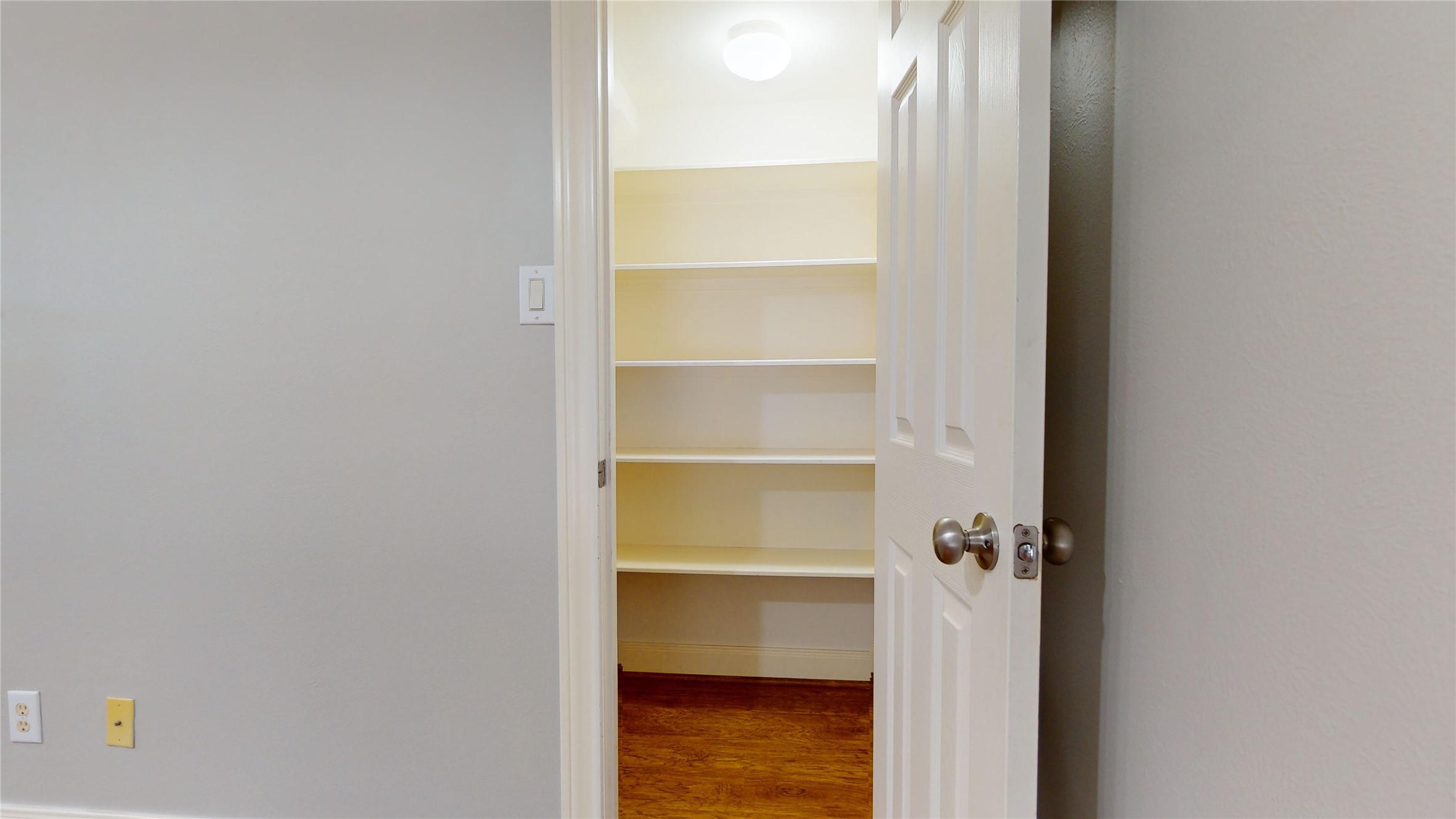 328 Malone Street Houston, TX 77007 - Photo 28 of 50 a view of walk in closet with empty racks