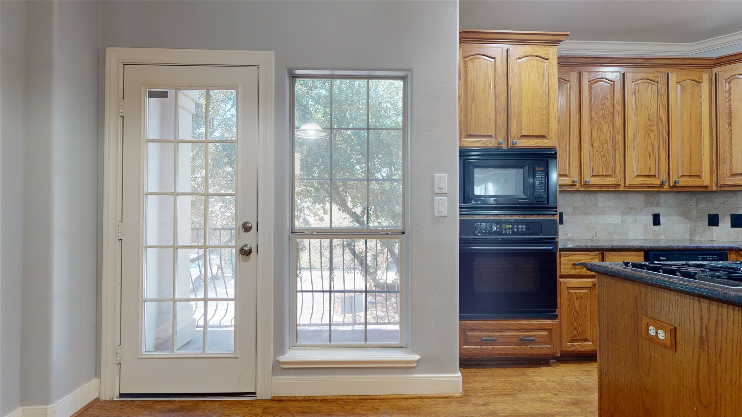 328 Malone Street Houston, TX 77007 - Photo 29 of 50 a kitchen with stainless steel appliances granite countertop a refrigerator and a stove top oven