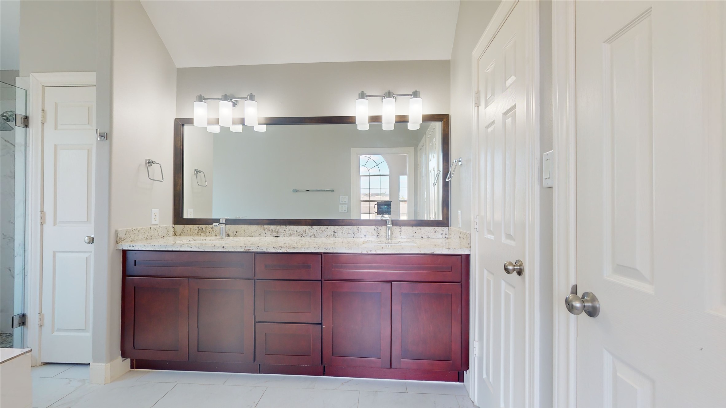 328 Malone Street Houston, TX 77007 - Photo 39 of 50 a bathroom with a granite countertop sink and a mirror