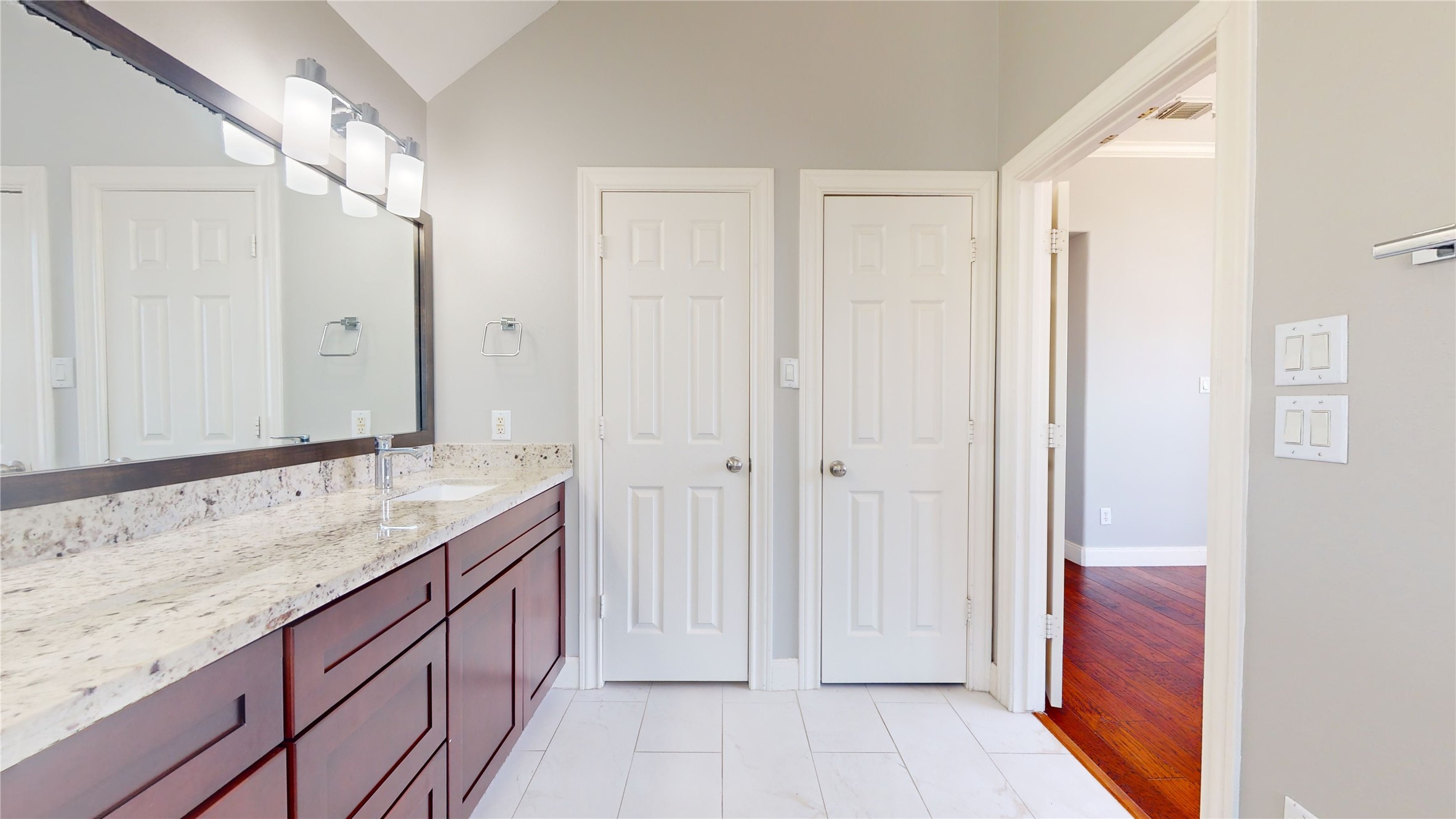 328 Malone Street Houston, TX 77007 - Photo 42 of 50 a bathroom with a granite countertop sink and a mirror
