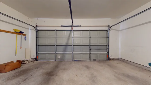 a view of an empty room with empty shelves