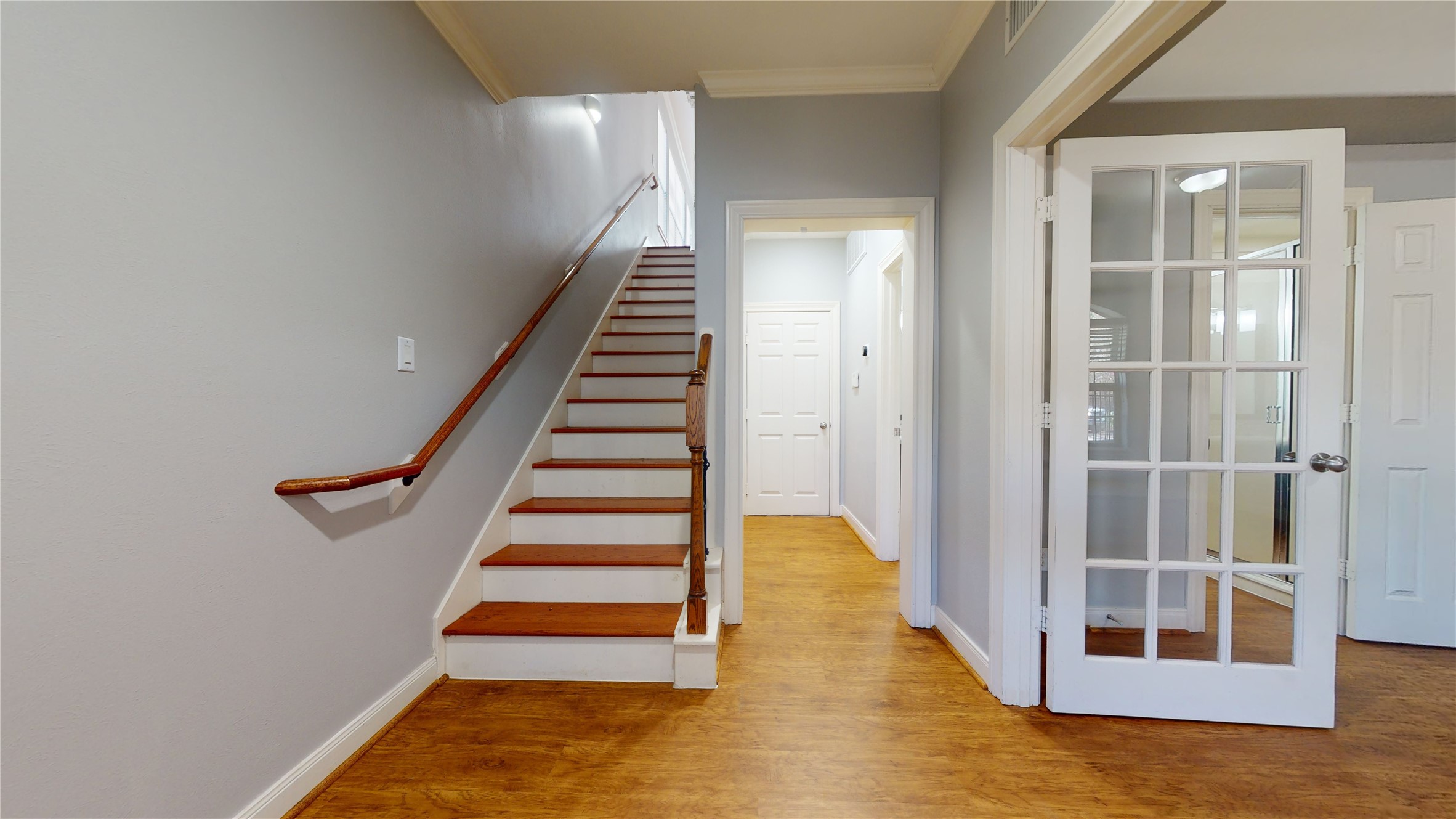 328 Malone Street Houston, TX 77007 - Photo 6 of 50 a view of entryway and hall with wooden floor