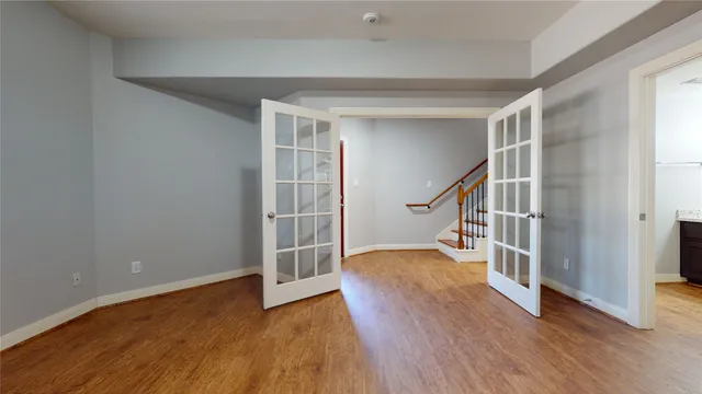 a view of entryway with wooden floor