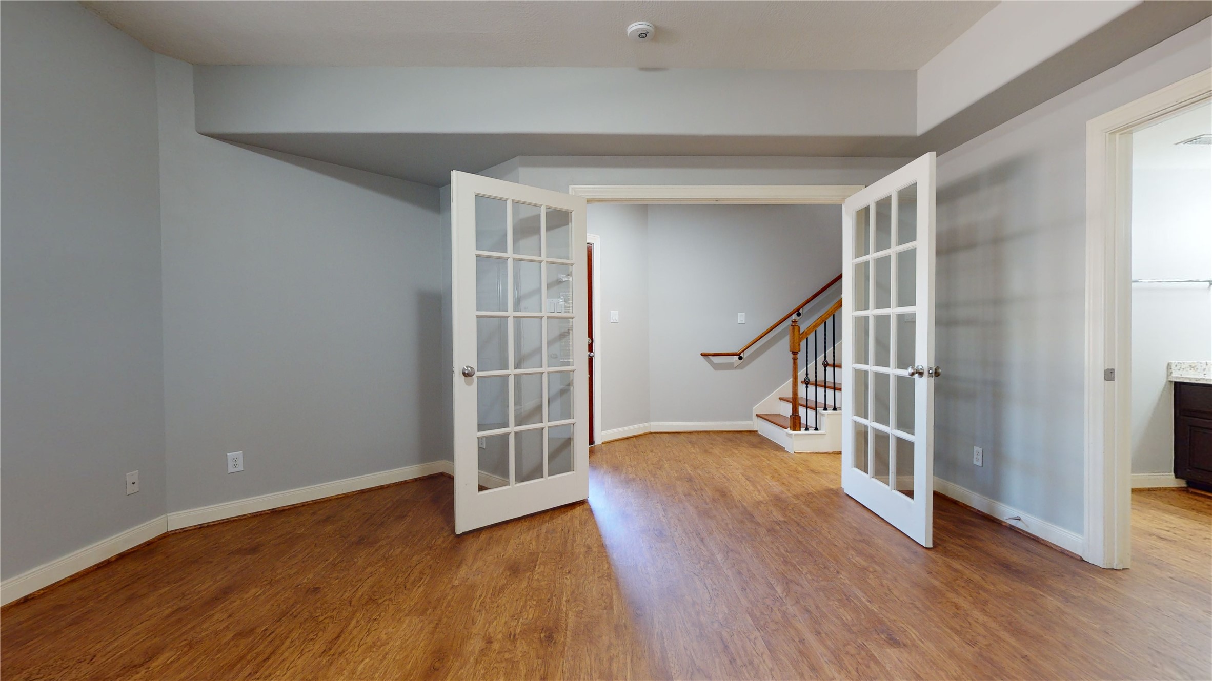 328 Malone Street Houston, TX 77007 - Photo 9 of 50 a view of entryway with wooden floor