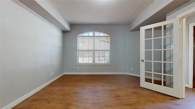 an empty room with windows