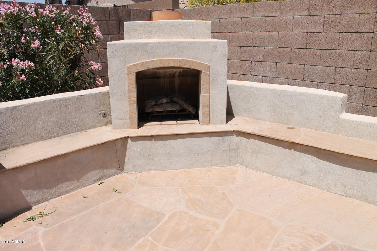 3872 East Simpson Road Gilbert, AZ 85297 - Photo 28 of 32 Fireplace with Seating