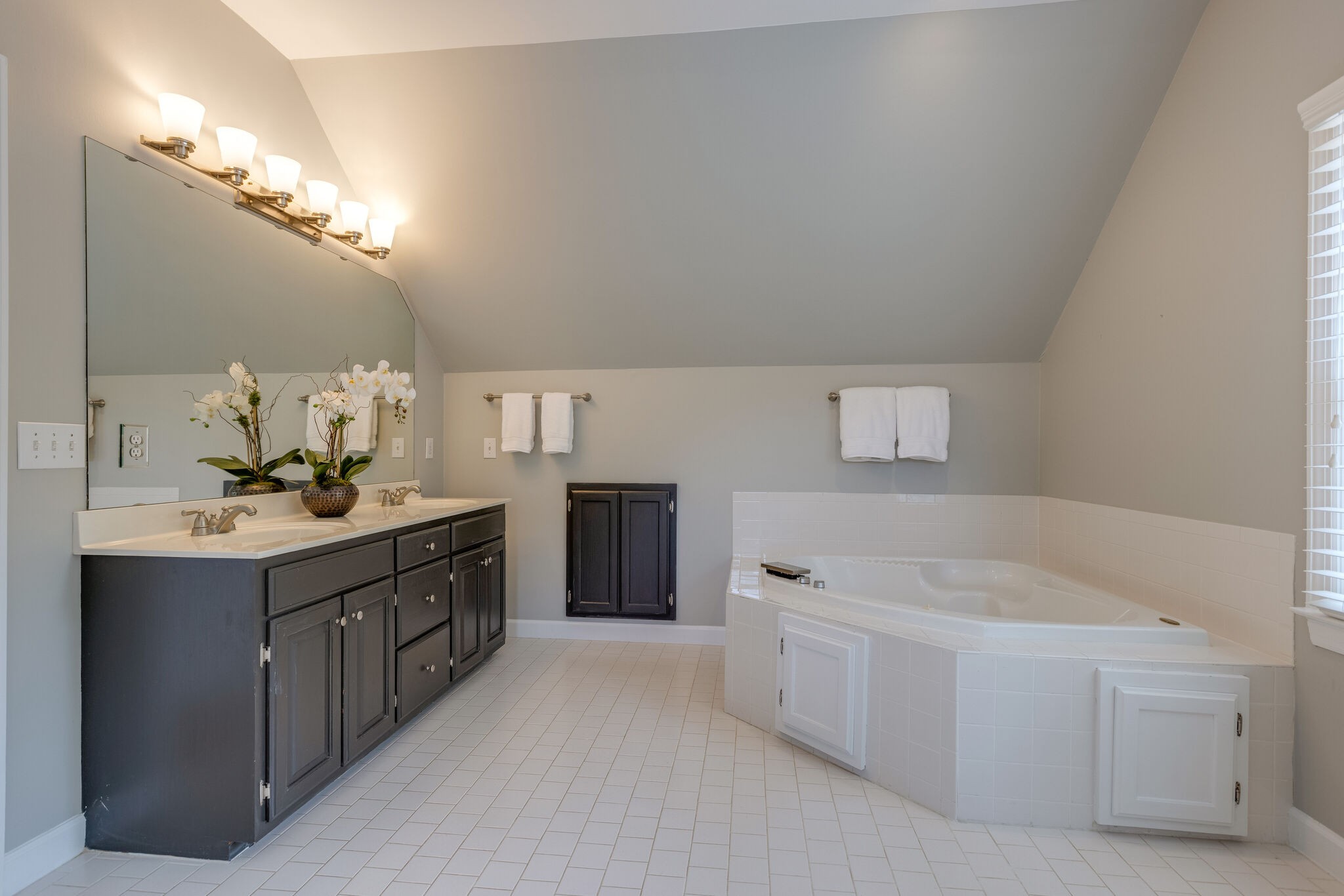 211 Hillside Drive Franklin, TN 37067 - Photo 18 of 43 a spacious bathroom with a tub double sink and mirror