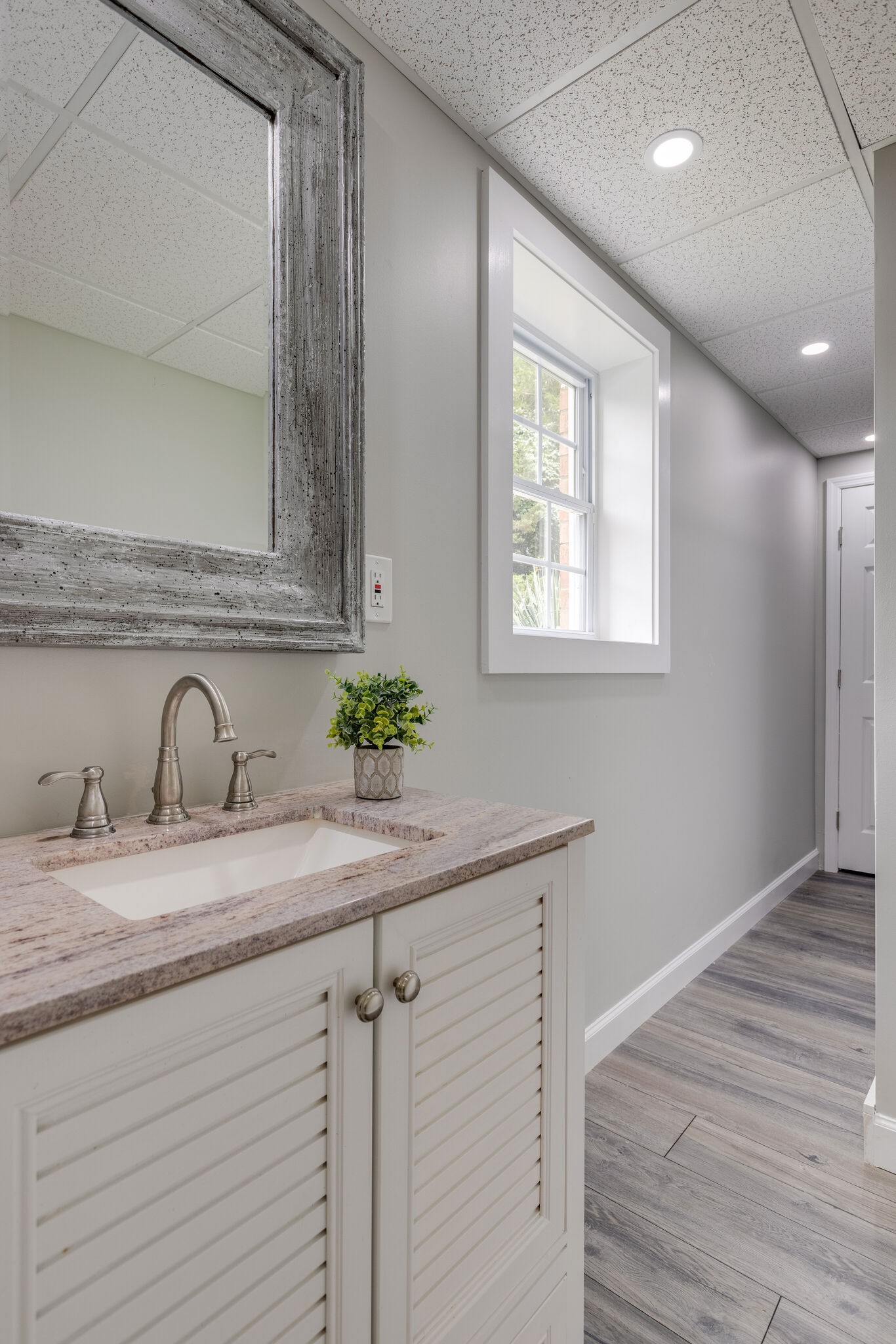 211 Hillside Drive Franklin, TN 37067 - Photo 27 of 43 a bathroom with a granite countertop sink and a mirror