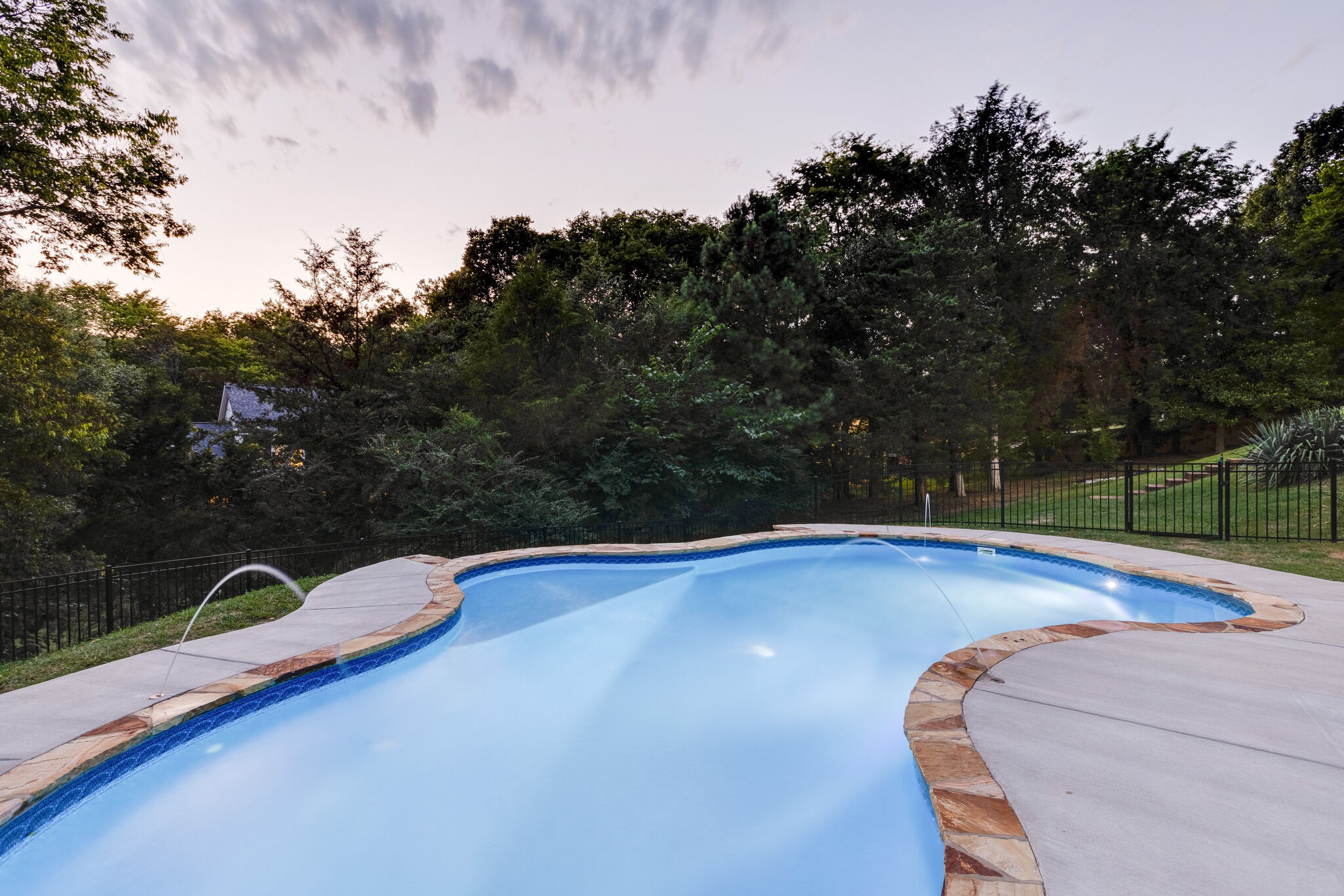211 Hillside Drive Franklin, TN 37067 - Photo 30 of 43 a view of a swimming pool with a yard